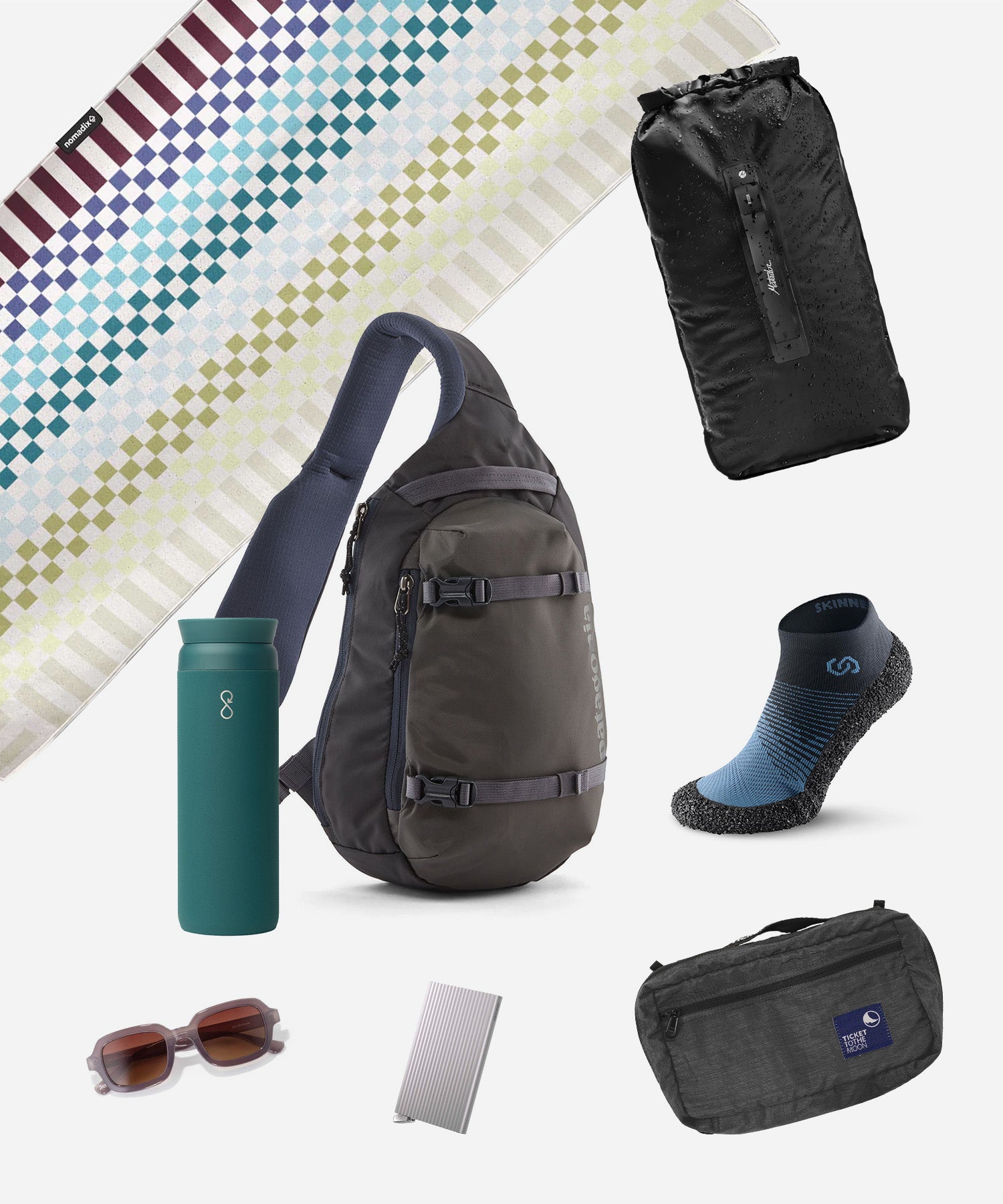 Outdoor gear collection including a black sling bag, teal water bottle, blue socks, sunglasses, dry bag, waist pack