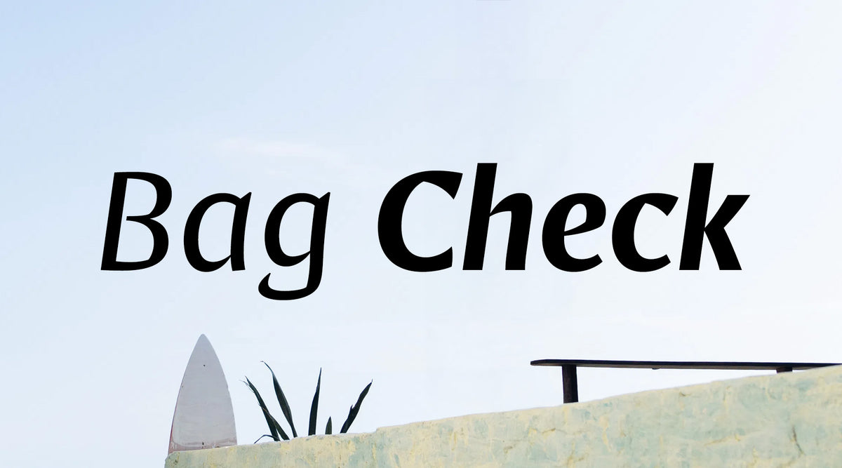 Bag Check text on a light blue sky background with a surfboard and plant visible.
