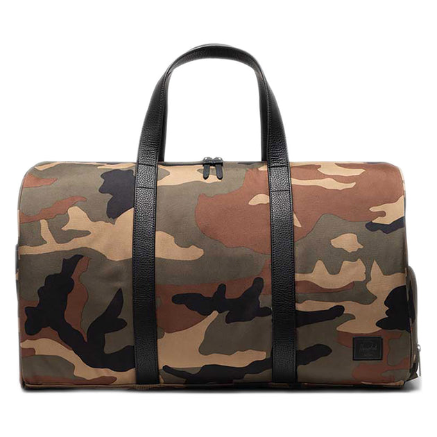 Herschel Novel Duffle Herschel Supply Co. 11396-07129-OS Duffle Bags 43L / Woodland Camo/Black Label