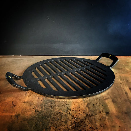 https://wildbounds.myshopify.com/cdn/shop/products/netherton-foundry-15-barbecue-chapa-outdoor-cookware-one-size-black-nfs-282-1-12784567681068_530x.jpg?v=1589822878